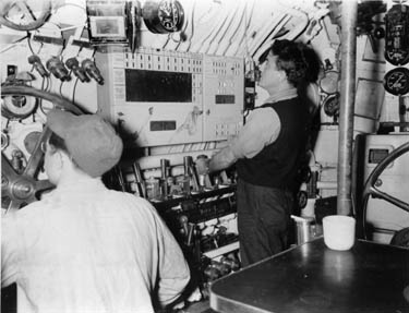 At the controls